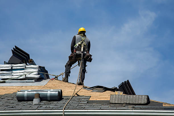 Professional Roofing technician working in Lakeville, NY